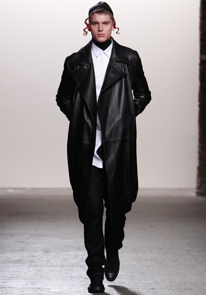 designer-ricardo-seco-sent-this-model-down-the-runway-in-a-harsh-leather-coat-and-what-looked-like-payot-hair-curls-worn-by-hasidic-jews